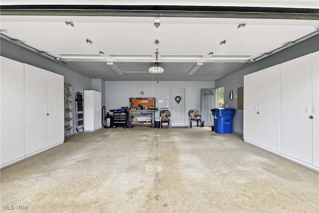 1421 Rolling Meadows Dr, Vermilion, OH 44089 - garage featuring a garage door opener