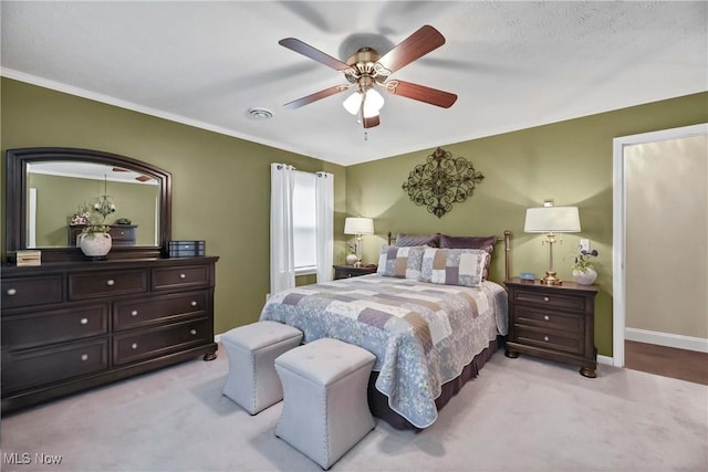 1421 Rolling Meadows Dr, Vermilion, OH 44089 - carpeted bedroom with baseboards, a ceiling fan, and crown molding
