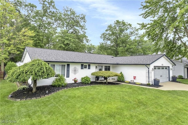 1421 Rolling Meadows Dr, Vermilion, OH 44089 - ranch-style house with concrete driveway, a garage, a front yard, and roof with shingles