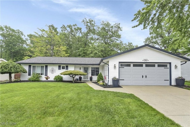 1421 Rolling Meadows Dr, Vermilion, OH 44089 - ranch-style home with a garage, concrete driveway, and a front lawn
