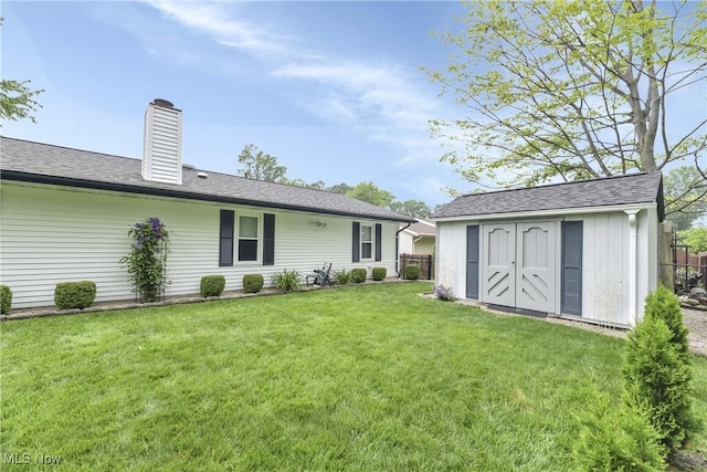 1421 Rolling Meadows Dr, Vermilion, OH 44089 - back of property with a chimney