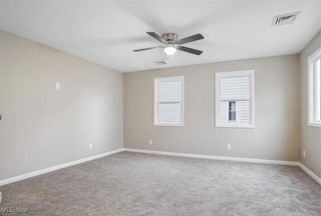 151 E 5th St, Salem, OH 44460 - carpeted spare room with ceiling fan and baseboards