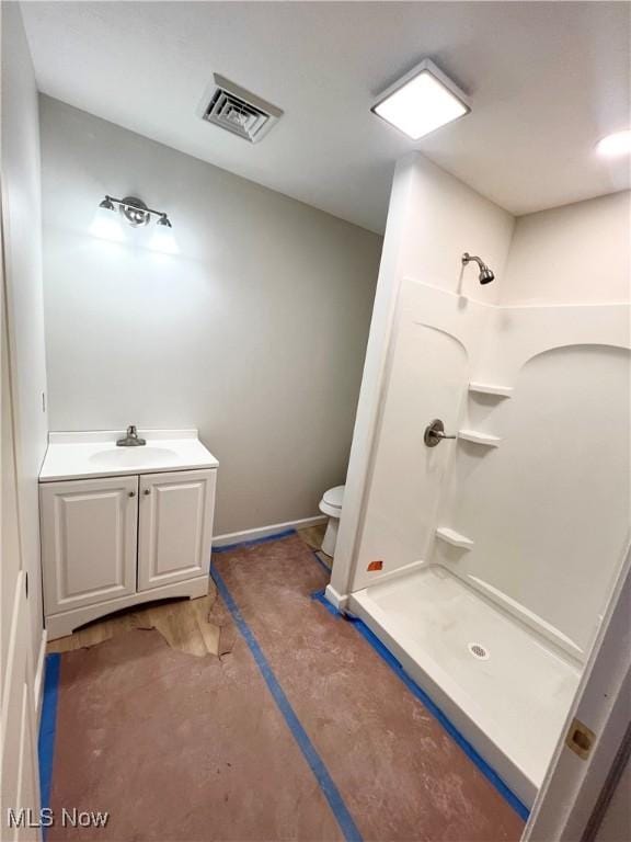 151 E 5th St, Salem, OH 44460 - full bath featuring a stall shower, toilet, vanity, and baseboards