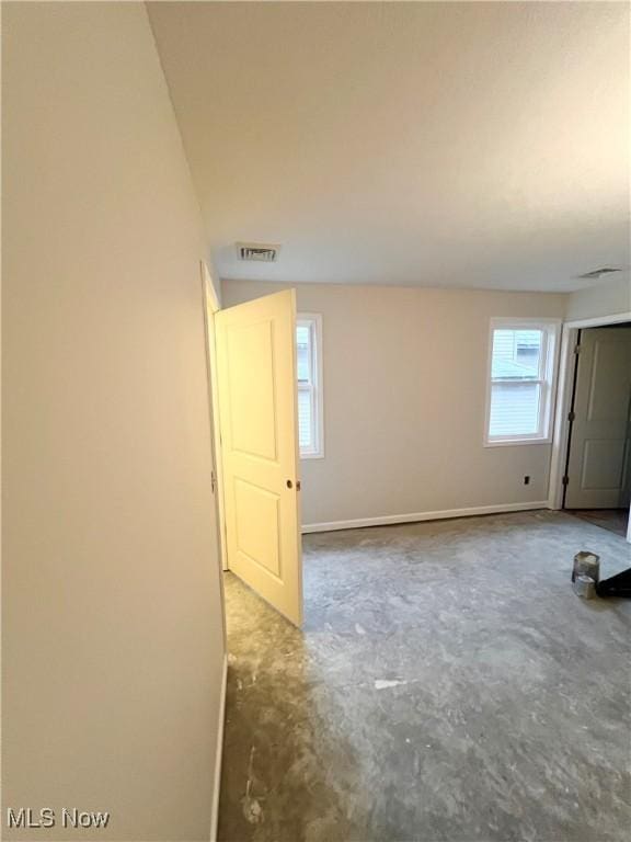151 E 5th St, Salem, OH 44460 - spare room featuring unfinished concrete floors