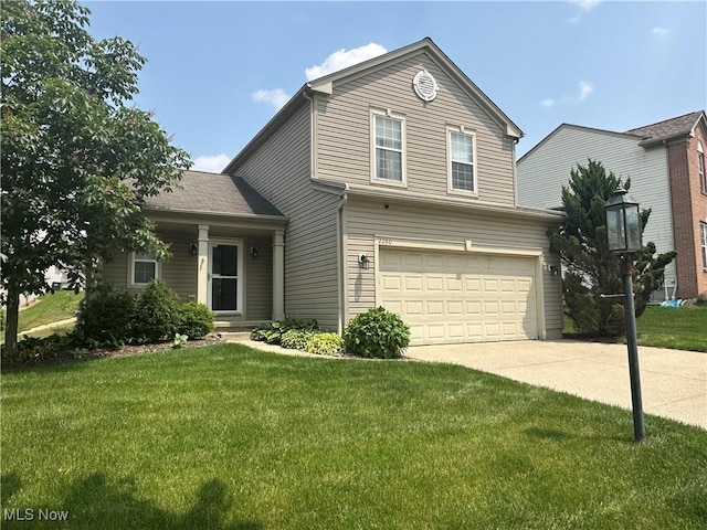 2280 Becket Cir, Stow, OH 44224 - traditional-style home featuring an attached garage, driveway, and a front lawn
