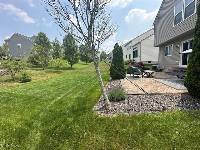 2280 Becket Cir, Stow, OH 44224 - view of green lawn with a patio area, cooling unit, and a residential view