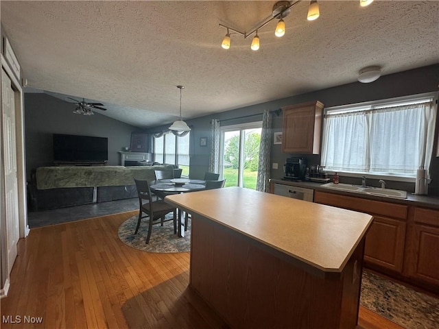 2280 Becket Cir, Stow, OH 44224 - kitchen with a sink, a textured ceiling, dishwasher, dark wood finished floors, and ceiling fan