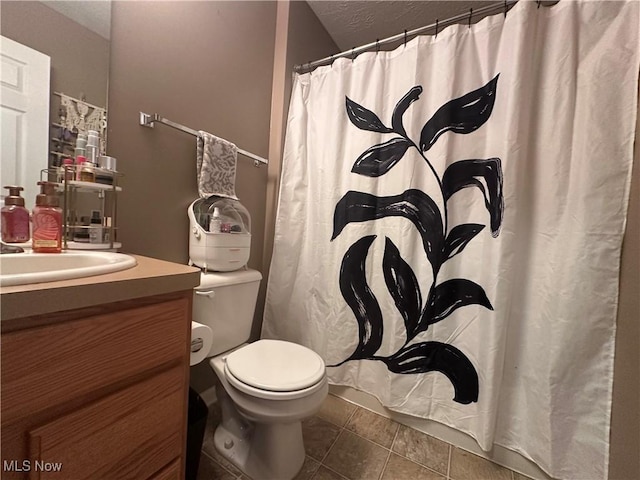 2280 Becket Cir, Stow, OH 44224 - full bathroom featuring toilet, vanity, tile patterned floors, a textured ceiling, and curtained shower