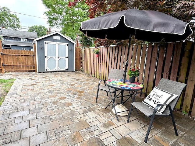 354 Hamilton Ave, Coshocton, OH 43812 - fenced backyard with a patio area and outdoor dining area