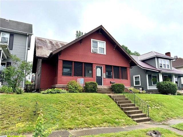 354 Hamilton Ave, Coshocton, OH 43812 - view of front of property with a front lawn