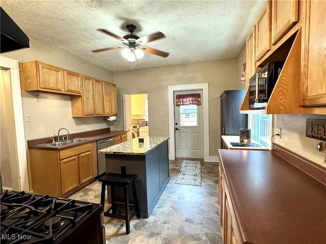 354 Hamilton Ave, Coshocton, OH 43812 - kitchen featuring a sink, dishwasher, a ceiling fan, stone finish flooring, and a center island