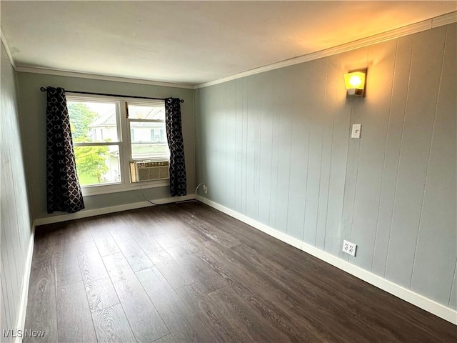 354 Hamilton Ave, Coshocton, OH 43812 - spare room with dark wood finished floors, crown molding, baseboards, and cooling unit
