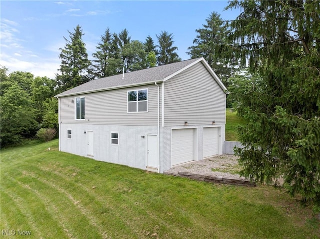 60922 Webb Heights Rd, Shadyside, OH 43947 - view of side of home featuring a garage, a lawn, driveway, and roof with shingles