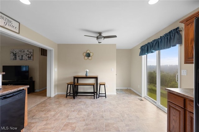 60922 Webb Heights Rd, Shadyside, OH 43947 - living room featuring a ceiling fan, stone finish floors, and baseboards