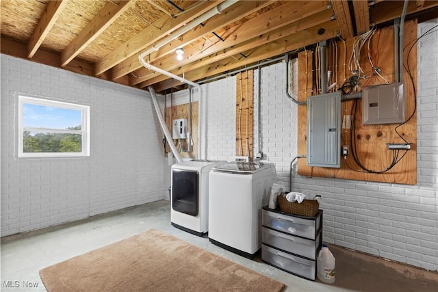 60922 Webb Heights Rd, Shadyside, OH 43947 - washroom with washer and clothes dryer, electric panel, and brick wall