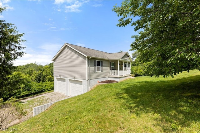 60922 Webb Heights Rd, Shadyside, OH 43947 - view of property exterior featuring a garage, covered porch, a yard, and driveway