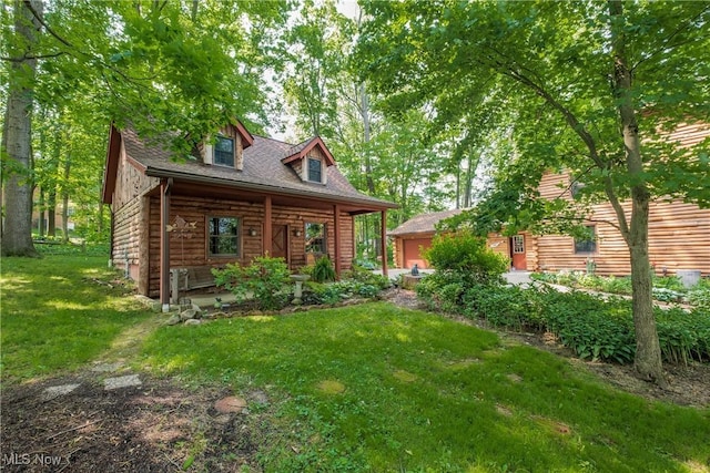 5820 Kildare Cir NW, Canton, OH 44718 - cabin featuring a front lawn, a porch, and log siding