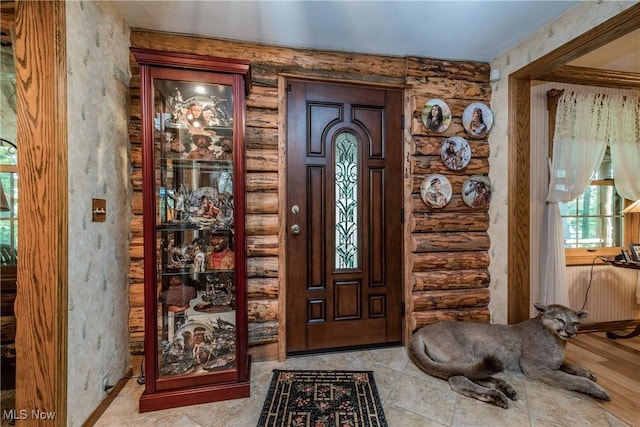 5820 Kildare Cir NW, Canton, OH 44718 - foyer with log walls