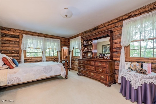 5820 Kildare Cir NW, Canton, OH 44718 - bedroom with log walls and carpet