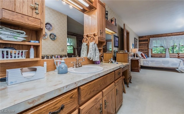 5820 Kildare Cir NW, Canton, OH 44718 - ensuite bathroom featuring wallpapered walls, vanity, and log walls