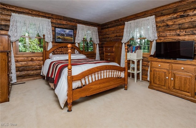 5820 Kildare Cir NW, Canton, OH 44718 - bedroom featuring multiple windows, light colored carpet, and rustic walls