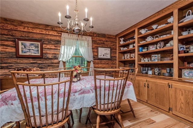 5820 Kildare Cir NW, Canton, OH 44718 - dining space featuring a chandelier and light wood-style flooring