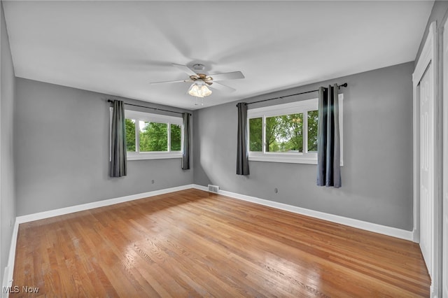 713 Highland Ave, Wadsworth, OH 44281 - empty room featuring ceiling fan, baseboards, and light wood-style floors
