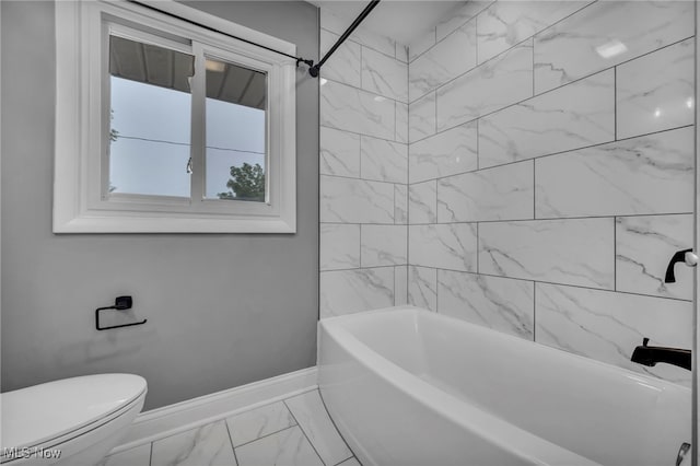713 Highland Ave, Wadsworth, OH 44281 - bathroom featuring marble finish flooring, baseboards, toilet, and shower / washtub combination