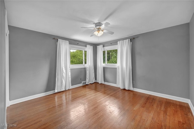 713 Highland Ave, Wadsworth, OH 44281 - empty room with a ceiling fan, baseboards, and wood finished floors
