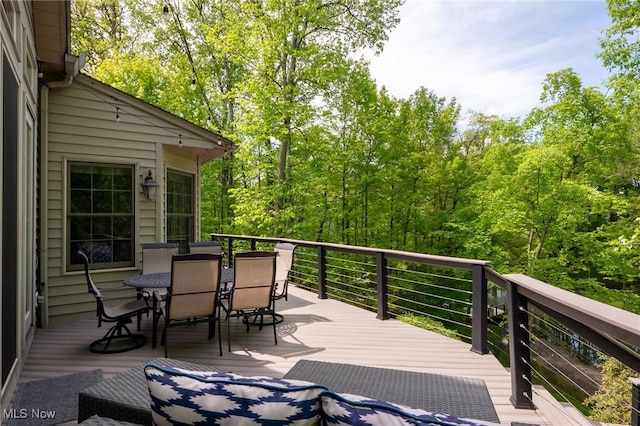 4151 Williamsburg Ct, Medina, OH 44256 - wooden deck with outdoor dining space