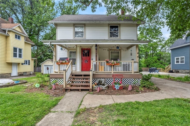 158 Humbolt Ave, Wadsworth, OH 44281 - traditional style home with covered porch, an outbuilding, and a front lawn
