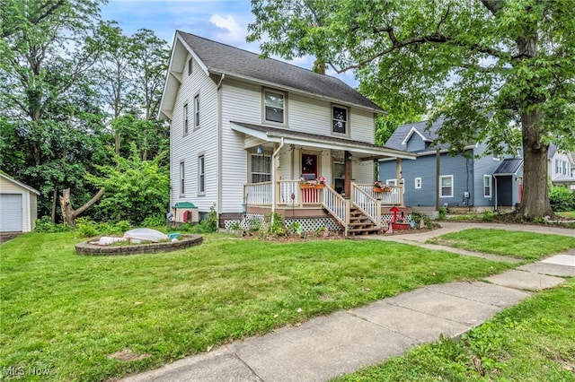 158 Humbolt Ave, Wadsworth, OH 44281 - traditional style home with covered porch, a front lawn, and an outdoor structure