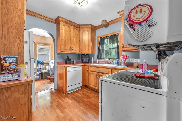 158 Humbolt Ave, Wadsworth, OH 44281 - kitchen with dishwasher, light wood-style floors, stove, exhaust hood, and ornamental molding