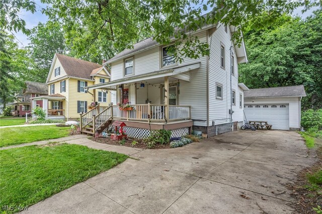 158 Humbolt Ave, Wadsworth, OH 44281 - american foursquare style home with a porch, a front yard, a garage, and an outbuilding