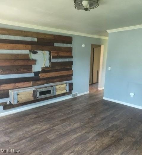 307 Township Road 245, Toronto, OH 43964 - unfurnished living room with ornamental molding, baseboards, and dark wood-style floors