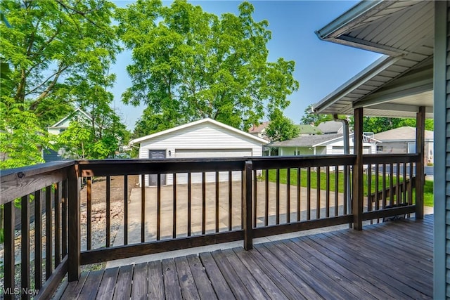 1260 Beardsley St, Akron, OH 44301 - wooden terrace featuring an outdoor structure and a detached garage