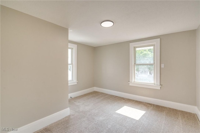 1260 Beardsley St, Akron, OH 44301 - spare room with carpet floors and baseboards