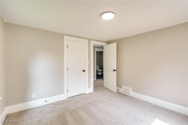 1260 Beardsley St, Akron, OH 44301 - empty room with carpet flooring and baseboards