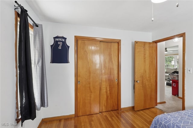 20800 Wilmore Ave, Euclid, OH 44123 - bedroom featuring wood finished floors, a closet, and baseboards