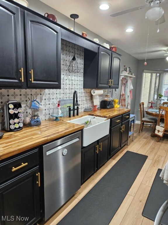 110 Olson Spur, Munroe Falls, OH 44262 - kitchen with stainless steel dishwasher, butcher block countertops, a sink, ceiling fan, and recessed lighting