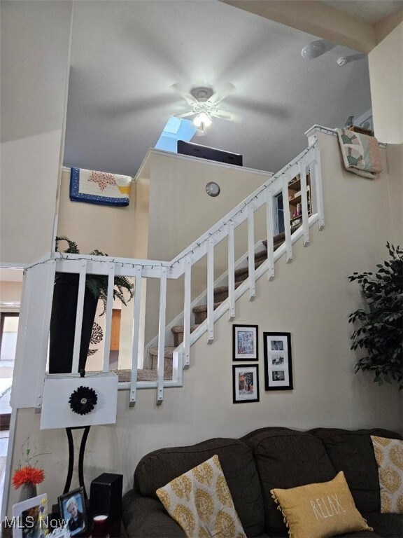 110 Olson Spur, Munroe Falls, OH 44262 - living area with a ceiling fan and stairway