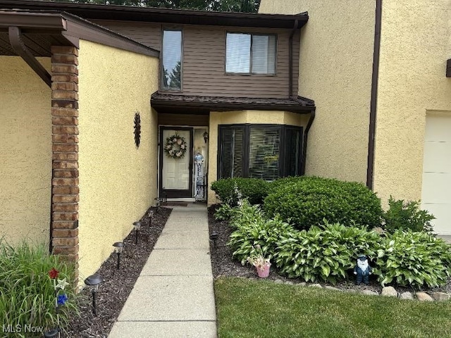 110 Olson Spur, Munroe Falls, OH 44262 - entrance to property featuring stucco siding