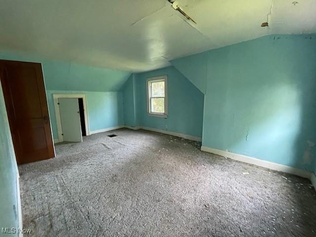 15262 Wadsworth Rittman Rd, Rittman, OH 44270 - bonus room with lofted ceiling, carpet floors, and baseboards