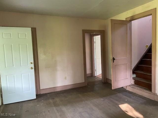 15262 Wadsworth Rittman Rd, Rittman, OH 44270 - empty room featuring baseboards and stairs