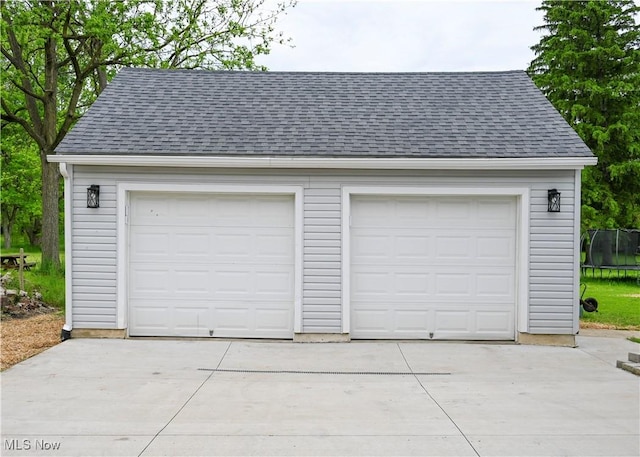 2948 Maple Ave NE, Canton, OH 44714 - detached garage with a trampoline