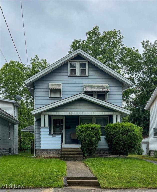3644 Irma Ave, Youngstown, OH 44502 - traditional style home with covered porch and a front yard