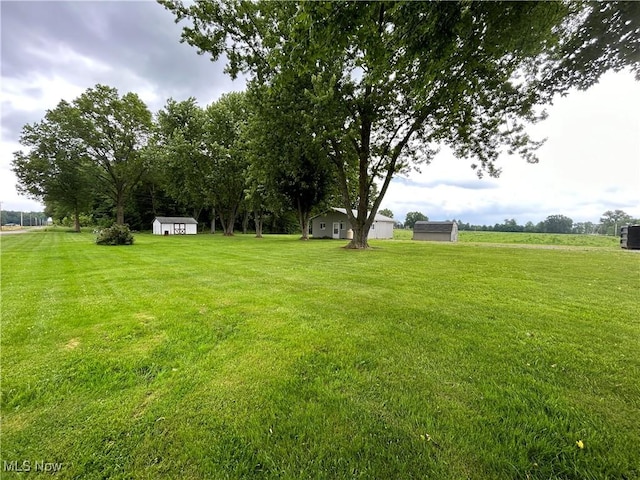 8973 Matty Rd, West Salem, OH 44287 - view of green lawn with central AC unit
