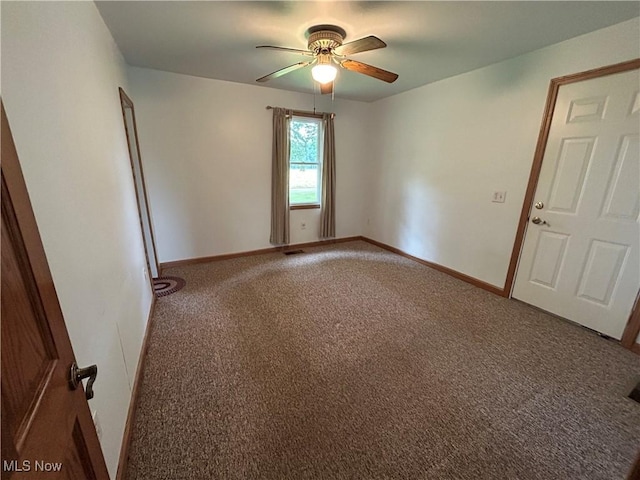 8973 Matty Rd, West Salem, OH 44287 - empty room with carpet, ceiling fan, and baseboards