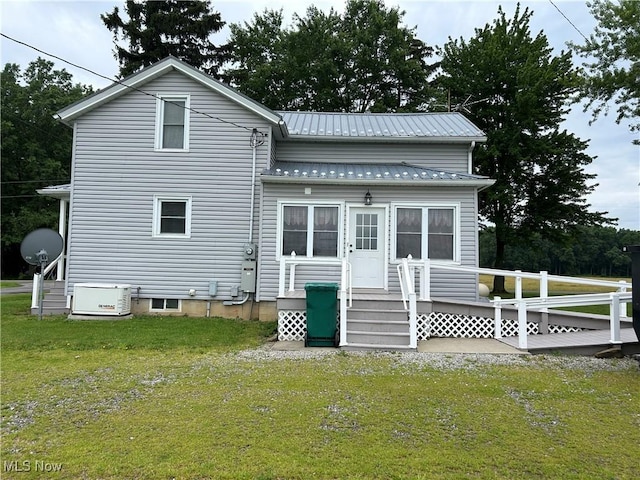8973 Matty Rd, West Salem, OH 44287 - rear view of house featuring a lawn and metal roof