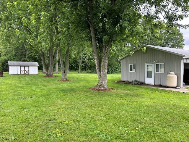 8973 Matty Rd, West Salem, OH 44287 - view of green lawn featuring an outbuilding